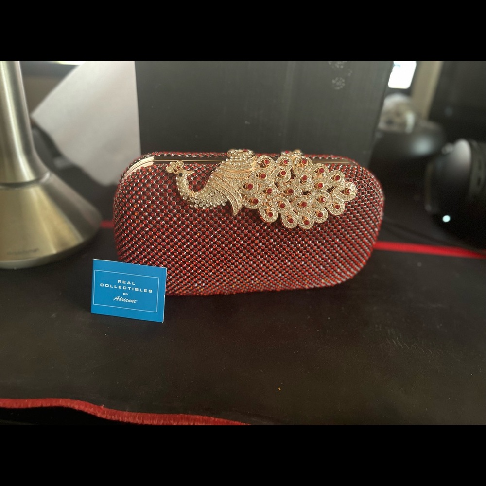 Real collectibles By Adrienne hand bag/Purse. Ruby red